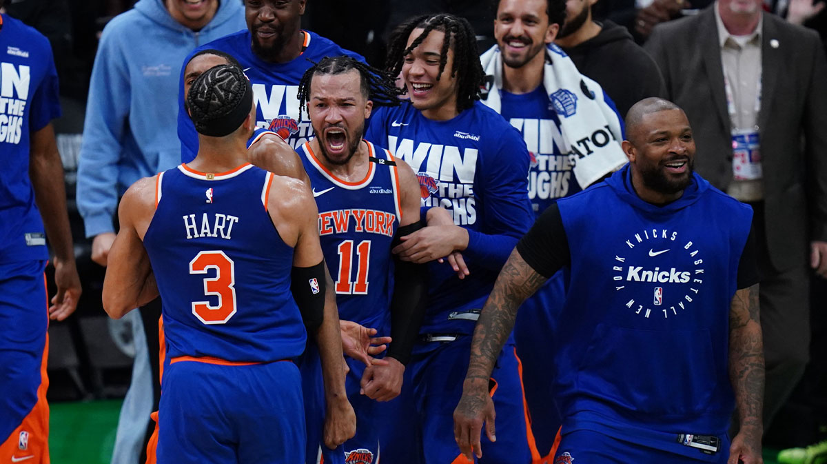 New York Knicks guard Jalen Brunson (11) reacts with teammates after defeating the Boston Celtics in overtime during game one of the second round for the 2025 NBA Playoffs at TD Garden