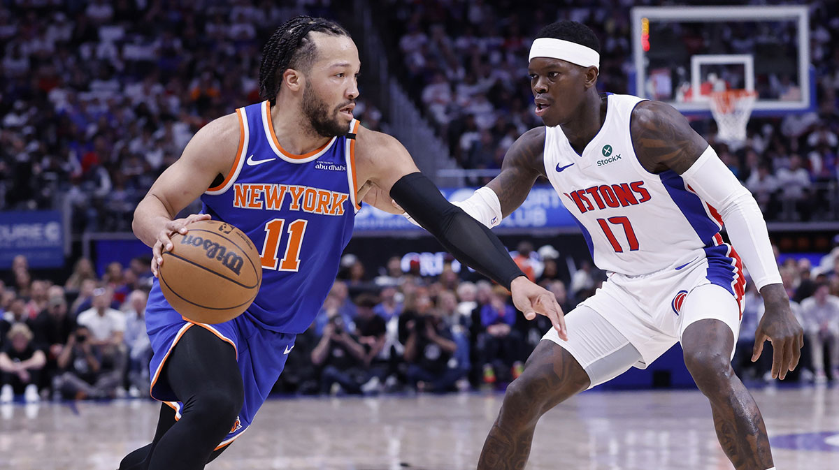 New York Knicks guard Jalen Brunson (11) dribbles defended by Detroit Pistons guard Dennis Schroder (17) in the first half during game six of first round for the 2024 NBA Playoffs at Little Caesars Arena.