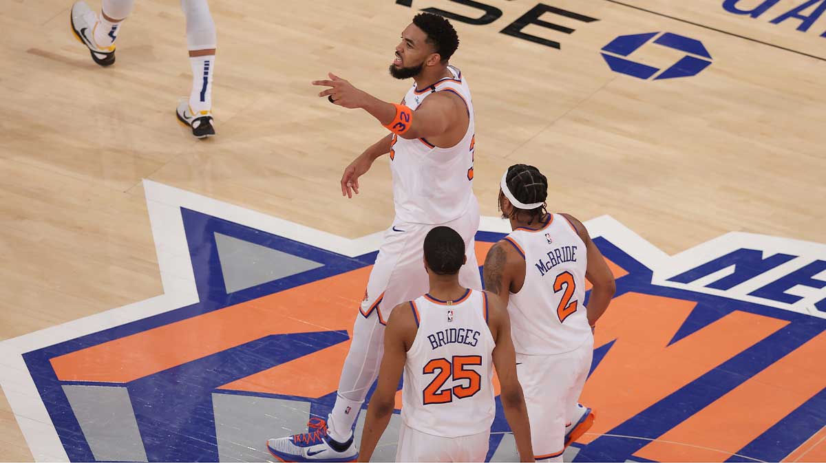 New York Knicks center Karl-Anthony Towns (32) celebrates a three point shot against the Indiana Pacers in the second quarter during game one of the eastern conference finals for the 2025 NBA Playoffs at Madison Square Garden.
