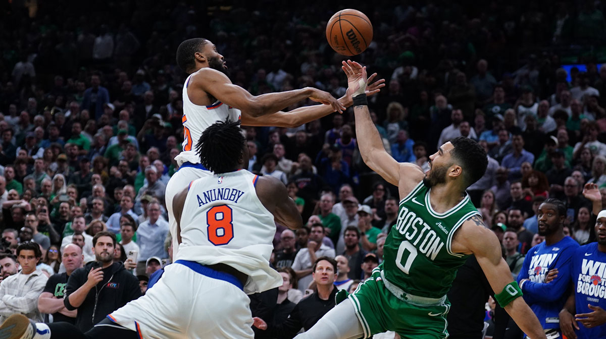 New York Knicks forward Mikal Bridges (25) defends against Boston Celtics forward Jayson Tatum (0) in the last seconds of the fourth quarter during game two of the second round for the 2025 NBA Playoffs at TD Garden.