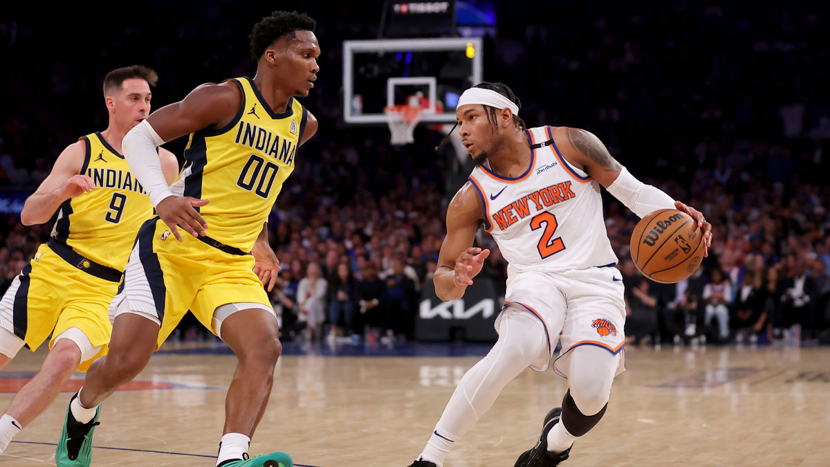 New York Knicks guard Miles McBride (2) controls the ball against Indiana Pacers guard Bennedict Mathurin (00) in the third quarter during game one of the eastern conference finals for the 2025 NBA Playoffs at Madison Square Garden.