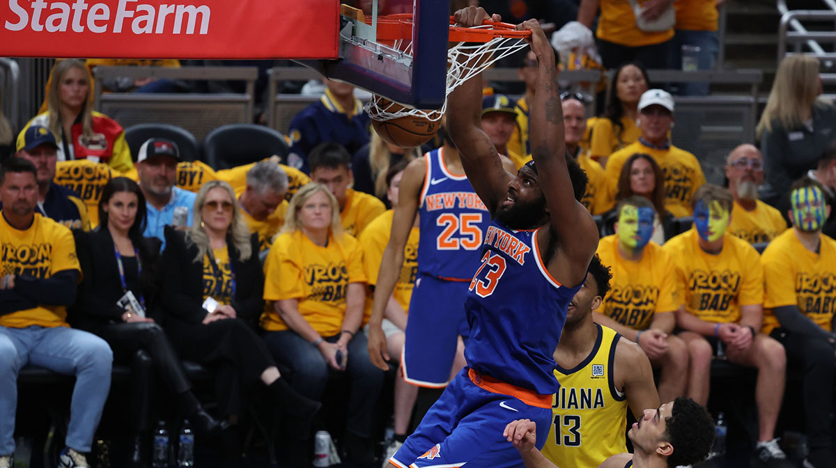 New York Knicks center Mitchell Robinson (23) dunks during the first quarter against the Indiana Pacers during game three of the eastern conference finals for the 2025 NBA Playoffs at Gainbridge Fieldhouse.
