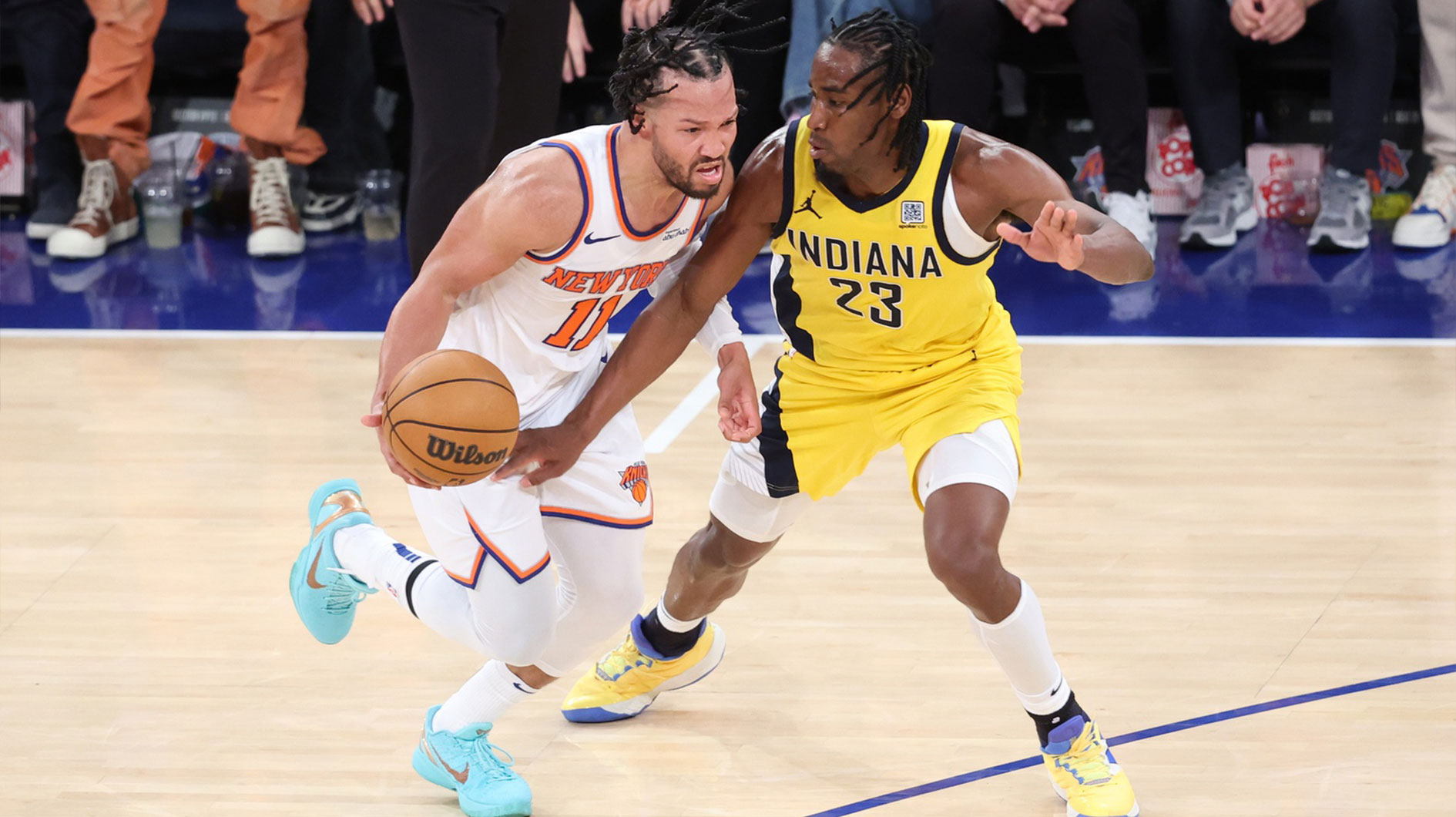 Knicks guard Jalen Brunson (11) attacks Pacers' Aaron Nesmith
