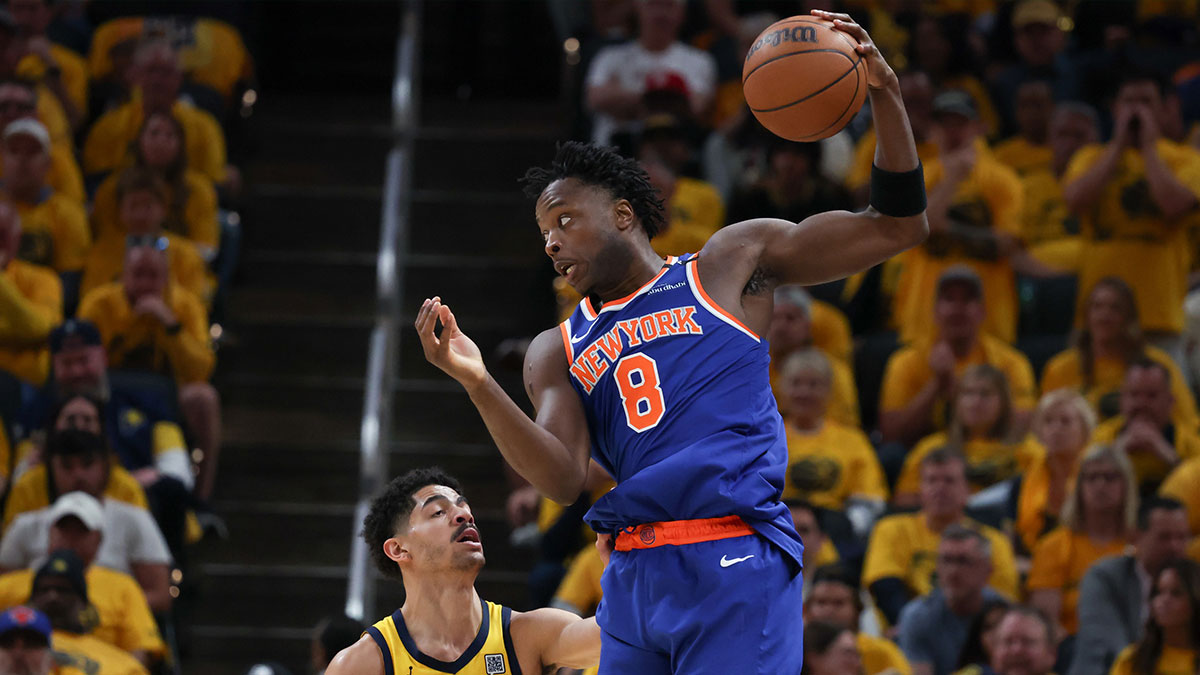 New York Knicks forward OG Anunoby (8) grabs the ball defended by Indiana Pacers guard Ben Sheppard (26) in the second quarter during game six of the eastern conference finals for the 2025 NBA Playoffs at Gainbridge Fieldhouse.