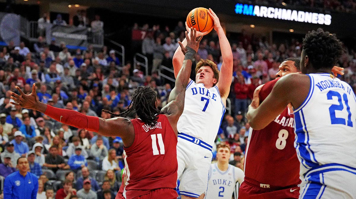 Duke Blue Devils guard Kon Knueppel (7) shoots the ball against Alabama Crimson Tide center Clifford Omoruyi (11) during the second half in the East Regional final of the 2025 NCAA tournament at Prudential Center.