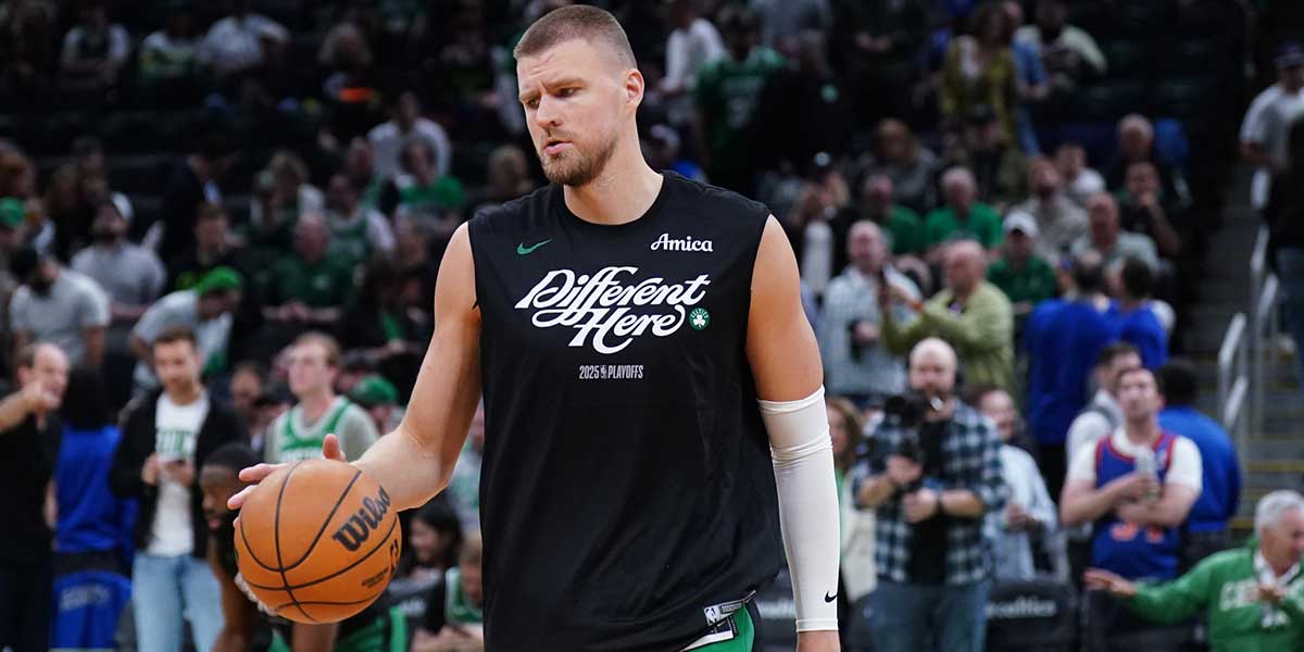 Boston Celtics center Kristaps Porzingis (8) warms up before the start of game two of the second round for the 2025 NBA Playoffs against the New York Knicks at TD Garden.