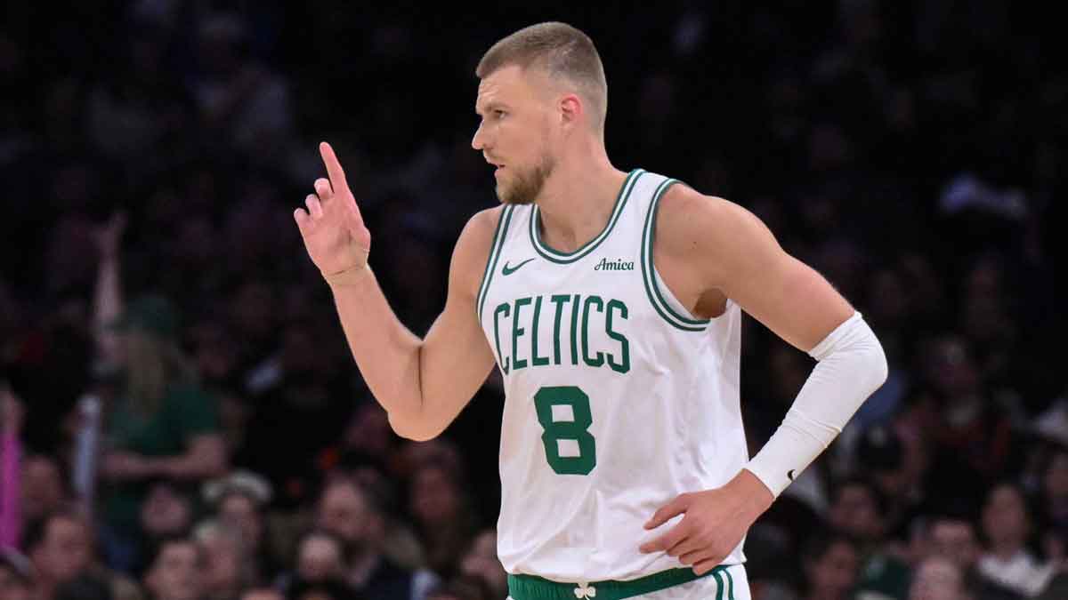 Boston Celtics center Kristaps Porzingis (8) reacts during the first half against the New York Knicks at Madison Square Garden.