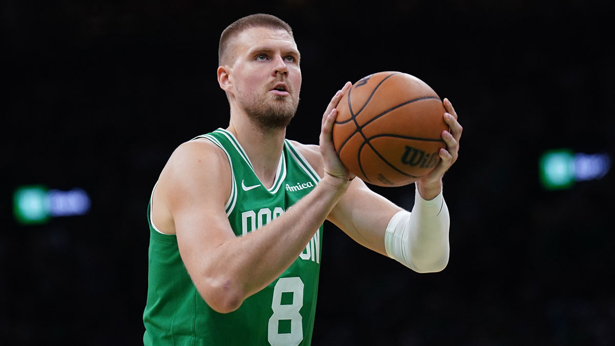 Boston Celtics center Kristaps Porzingis (8) shoots a free throw against the New York Knicks in the second half during game two of the second round for the 2025 NBA Playoffs at TD Garden.