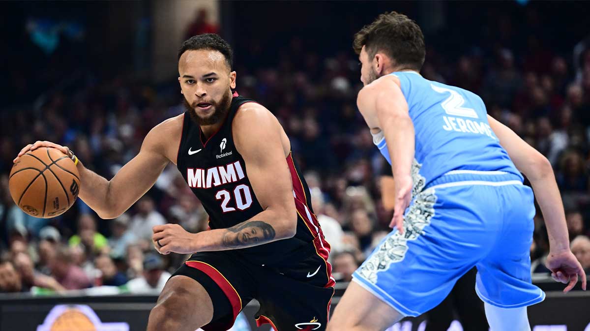 Miami Heat forward Kyle Anderson (20) drives to the basket against Cleveland Cavaliers guard Ty Jerome (2) during the first half at Rocket Arena.