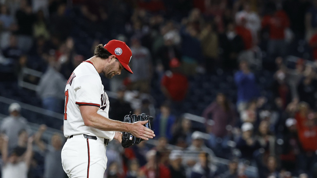 Washington Nationals pitcher Kyle Finnegan (67) reacts after the final out against the Atlanta Braves at Nationals Park.