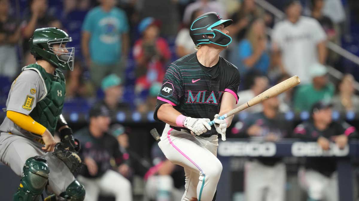 May 3, 2025; Miami, Florida, USA; Miami Marlins right fielder Kyle Stowers (28) hits a walk-off grand slam against the Oakland Athletics in the ninth inning at loanDepot Park.