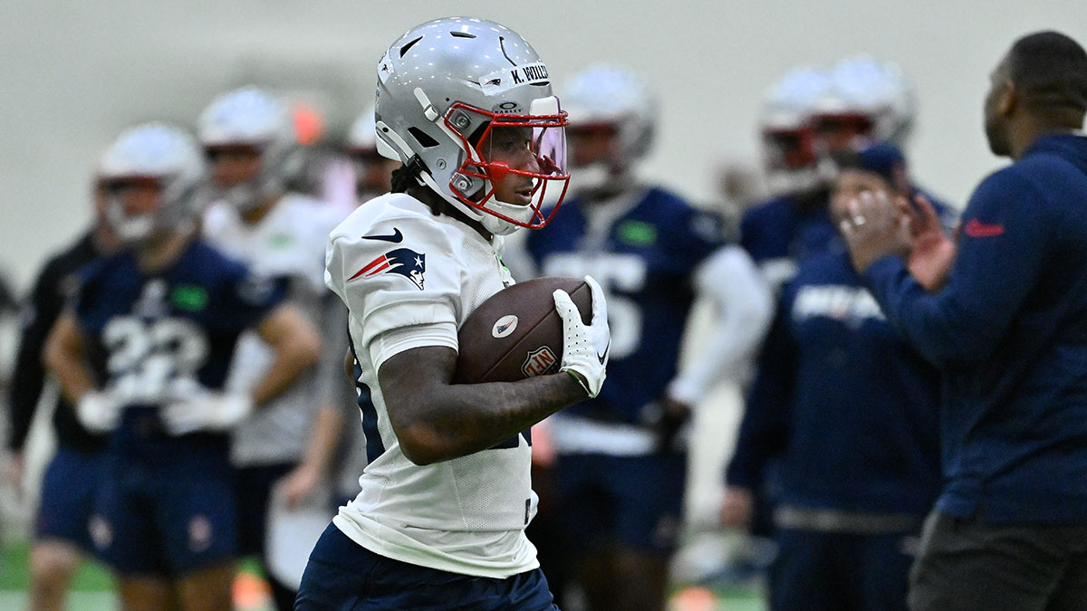 New England Patriots wide receiver Kyle Williams (18) runs with the ball during rookie camp at Gillette Stadium.