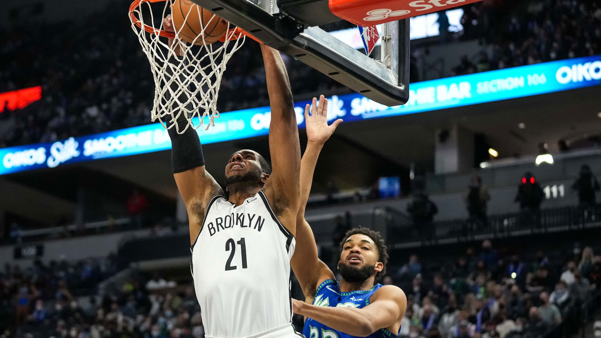 Brooklyn Nets center LaMarcus Aldridge (21) dunks during the first quarter against the Minnesota Timberwolves at Target Center.