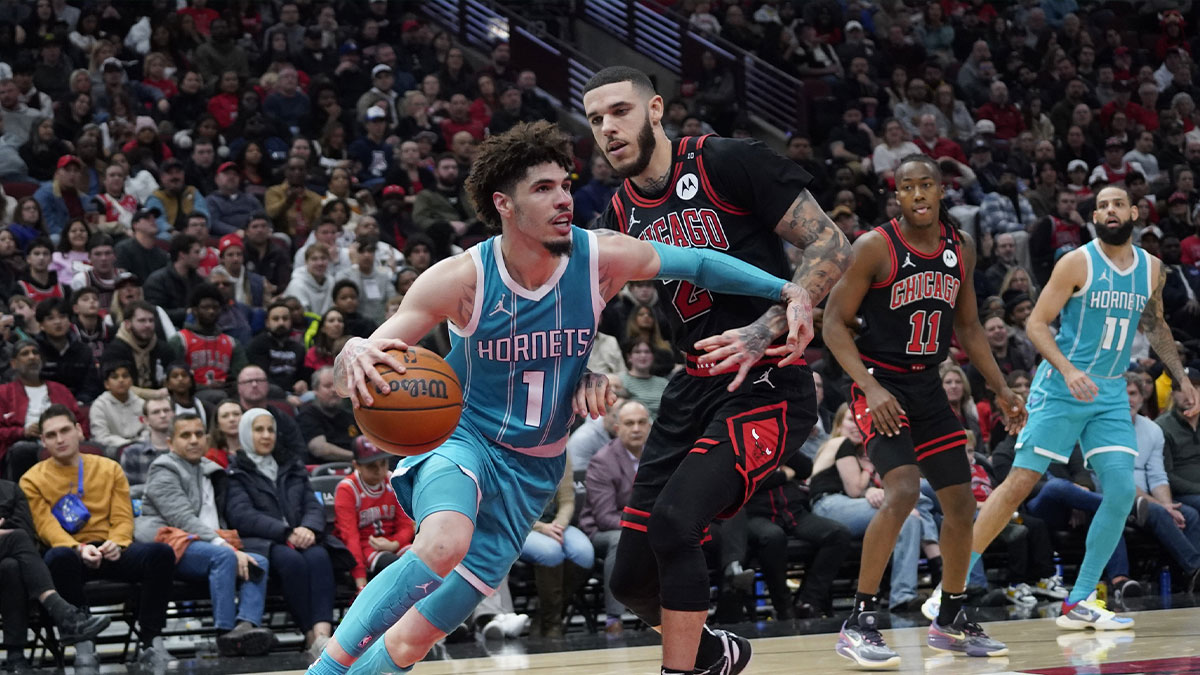 Chicago Bulls guard Lonzo Ball (2) defends Charlotte Hornets guard LaMelo Ball (1) during the second half at United Center.