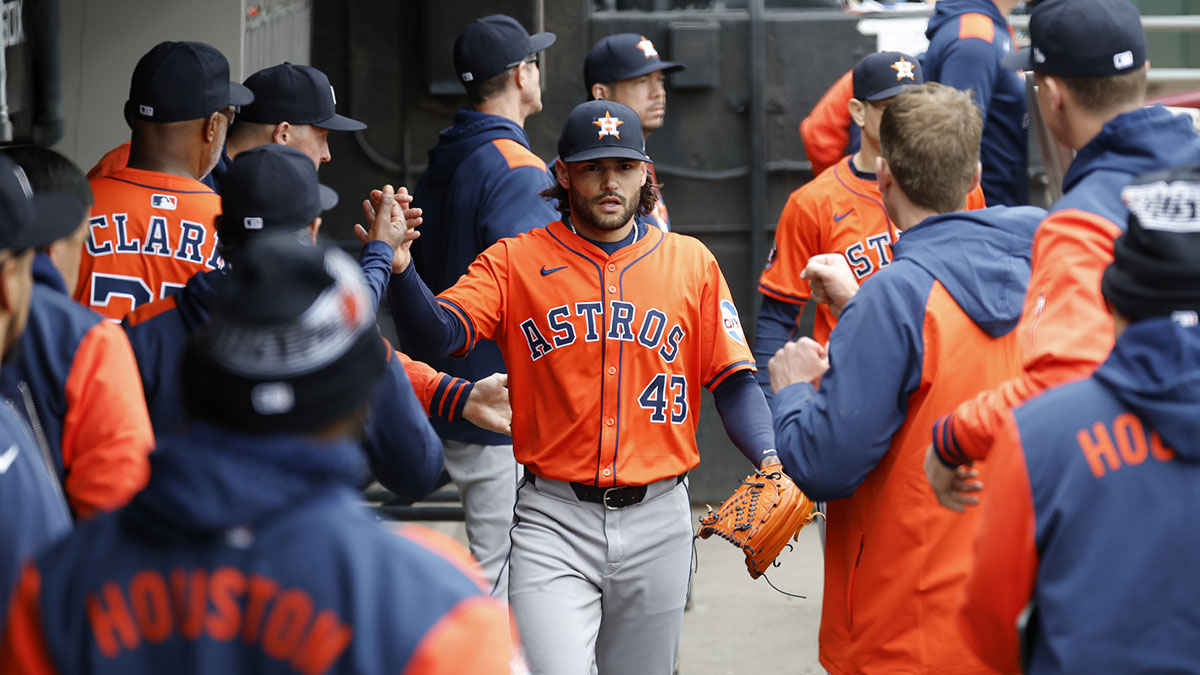 Houston Astros starting pitcher Lance McCullers Jr. (43) is greeted by teammates in the dugout after leaving a baseball game against the Chicago White Sox during the fourth inning at Rate Field.