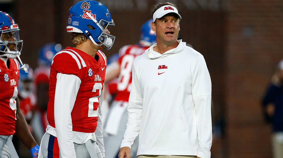 Ole Miss Rebels head coach Lane Kiffin (right) talks with quarterback Jaxson Dart (2) during warm ups prior to the game against the Vanderbilt Commodores at Vaught-Hemingway Stadium.
