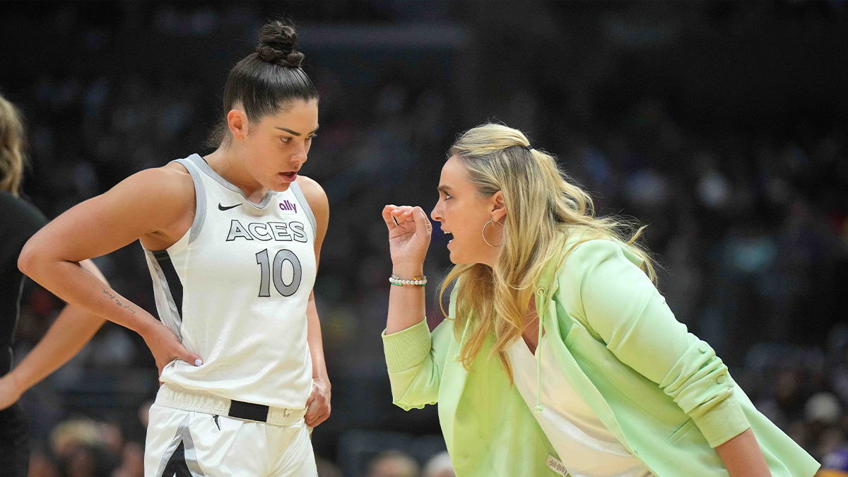 Las Vegas Aces coach Becky Hammon (right) talks with guard Kelsey Plum (10) in the second half against the LA Sparks at Crypto.com Arena.