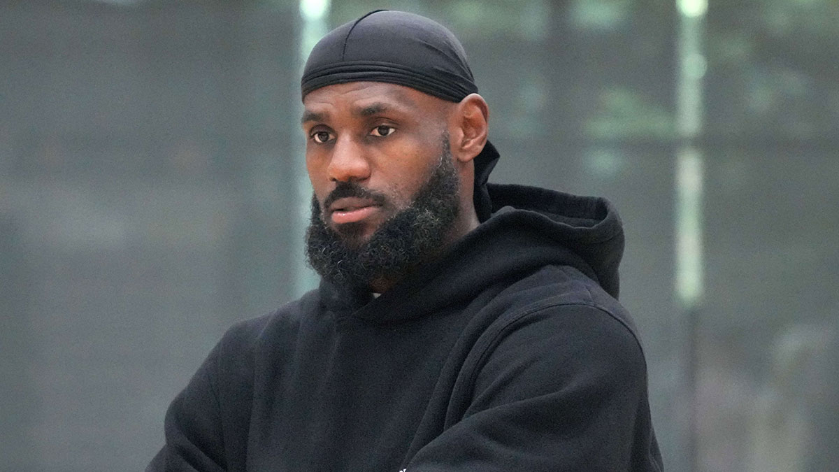 Los Angeles Lakers forward LeBron James watches at a press conference.