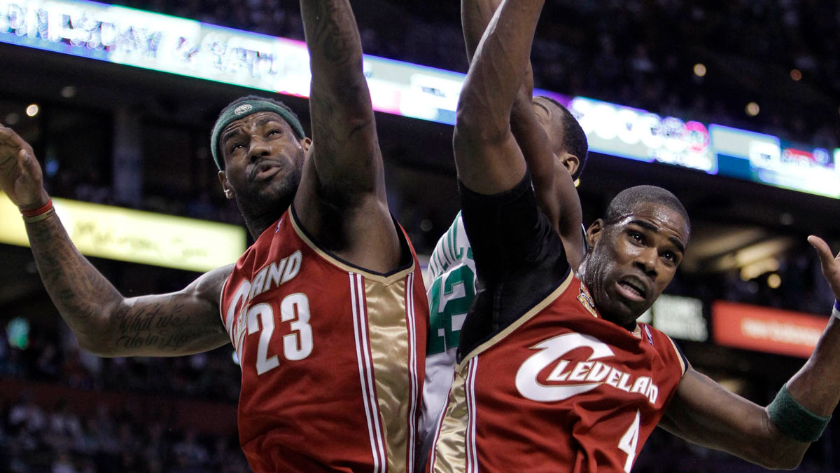Cleveland Cavaliers forward LeBron James (23) and forward Antawn Jamison (4) work for the ball against Boston Celtics center Kendrick Perkins (43) during the first quarter at the TD Banknorth Garden.