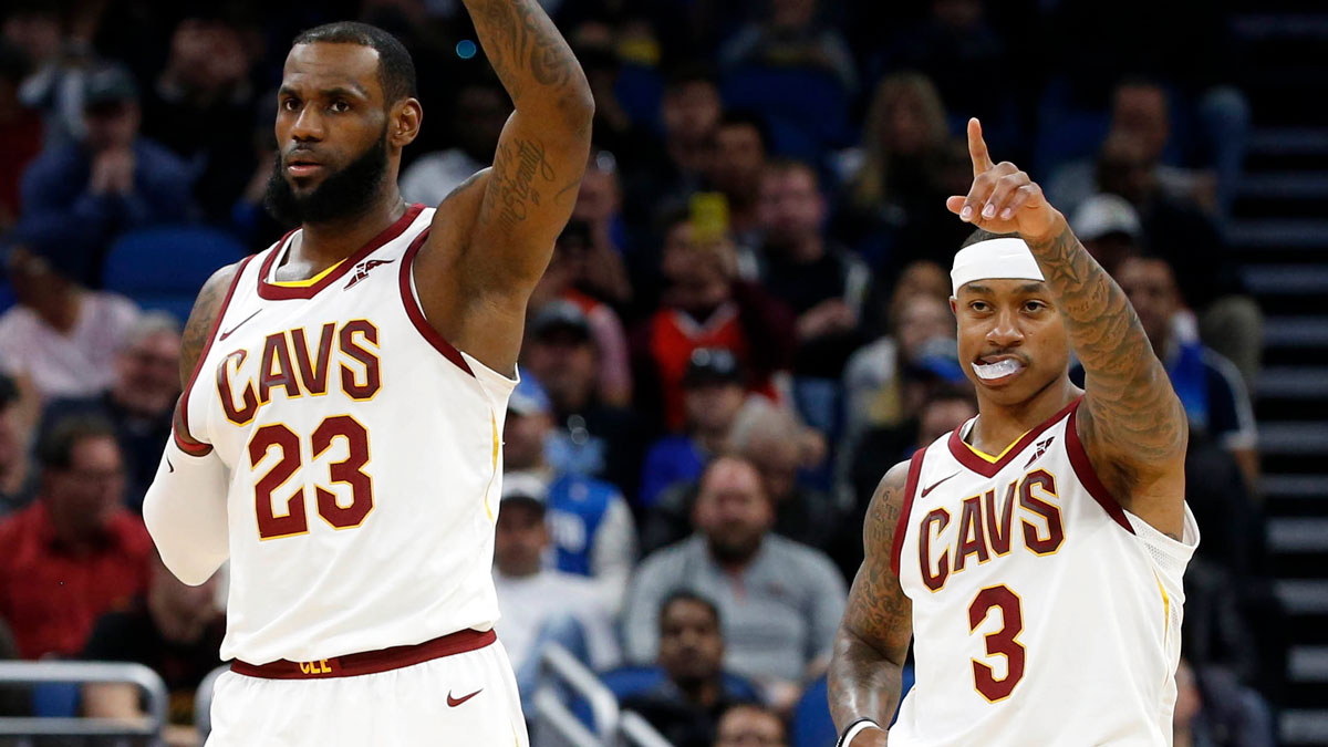 Cleveland Cavaliers forward LeBron James (23) and guard Isaiah Thomas (3) react during the first quarter against the Orlando Magic at Amway Center.