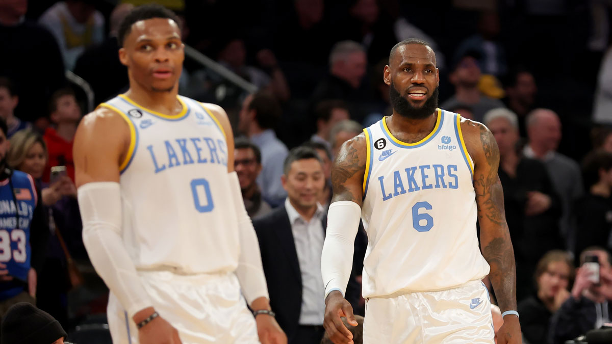 Los Angeles Lakers forward LeBron James (6) and guard Russell Westbrook (0) react during overtime against the New York Knicks at Madison Square Garden.