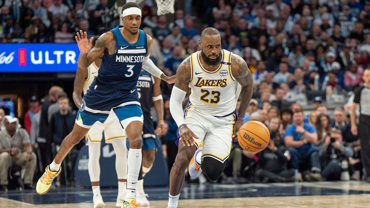Los Angeles Lakers forward LeBron James (23) chases the ball as a result of the defense of Minnesota Timberwolves forward Jaden McDaniels (3) in the third quarter during game four of first round for the 2025 NBA Playoffs at Target Center.