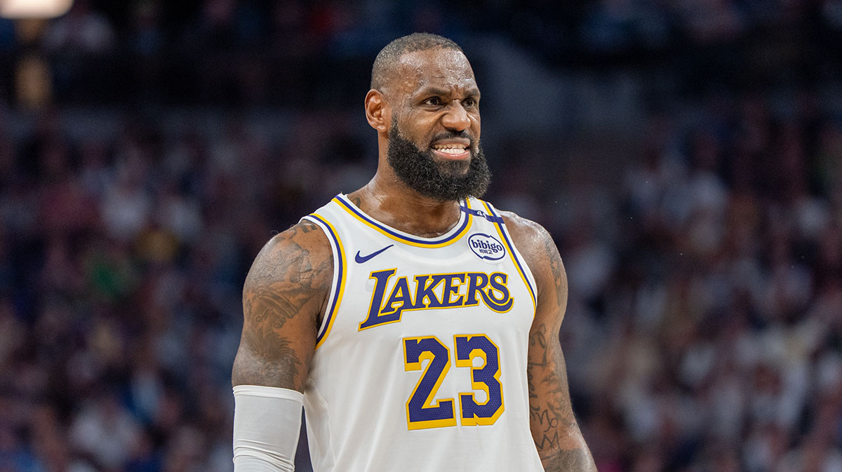 Los Angeles Lakers forward LeBron James (23) talks with a referee in the third quarter against the Minnesota Timberwolves during game four of first round for the 2025 NBA Playoffs at Target Center.