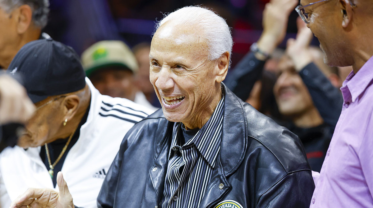 Former Seattle Supersonics head coach Lenny Wilkens acknowledges the fans after being introduced during a third quarter timeout of a preseason game between the Utah Jazz and LA Clippers at Climate Pledge Arena.