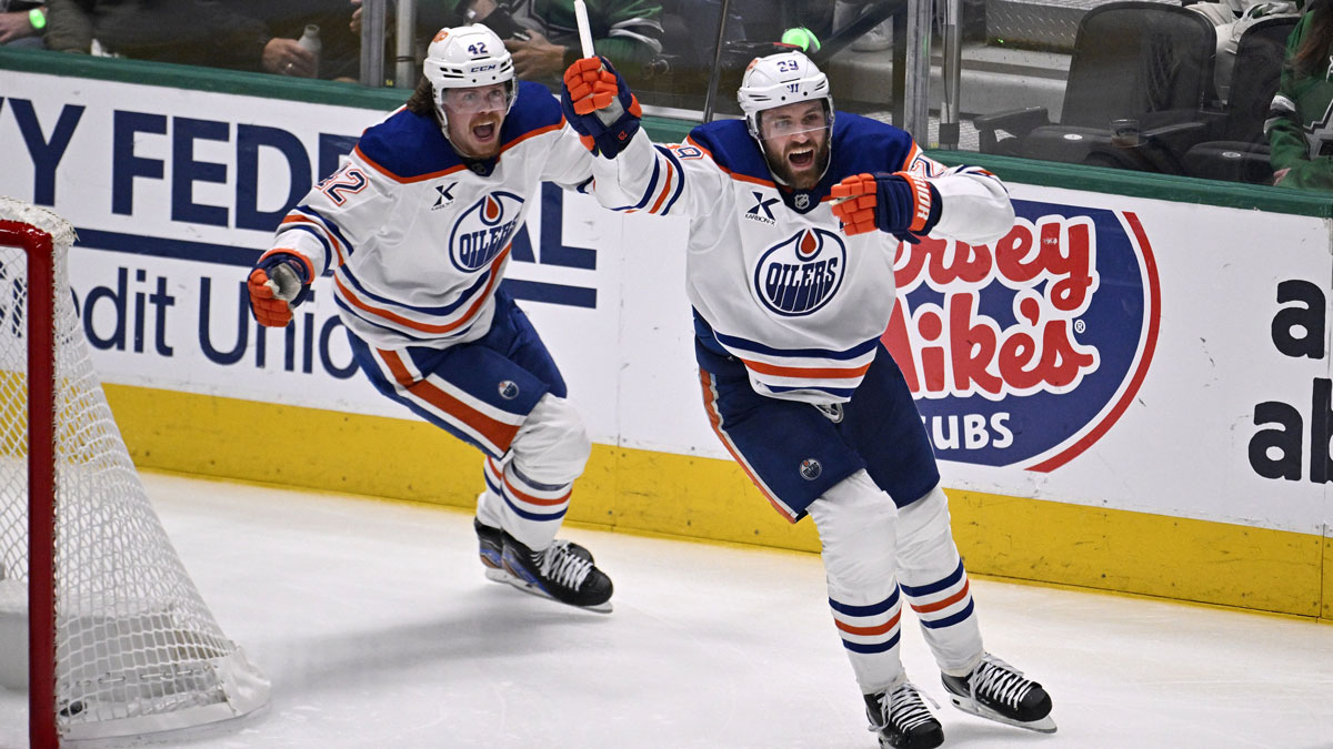 Edmonton Oilers center Leon Draisaitl (29) and right wing Kasperi Kapanen (42) react after a goal against the Dallas Stars during the third period in game five of the Western Conference Final of the 2025 Stanley Cup Playoffs at American Airlines Center.