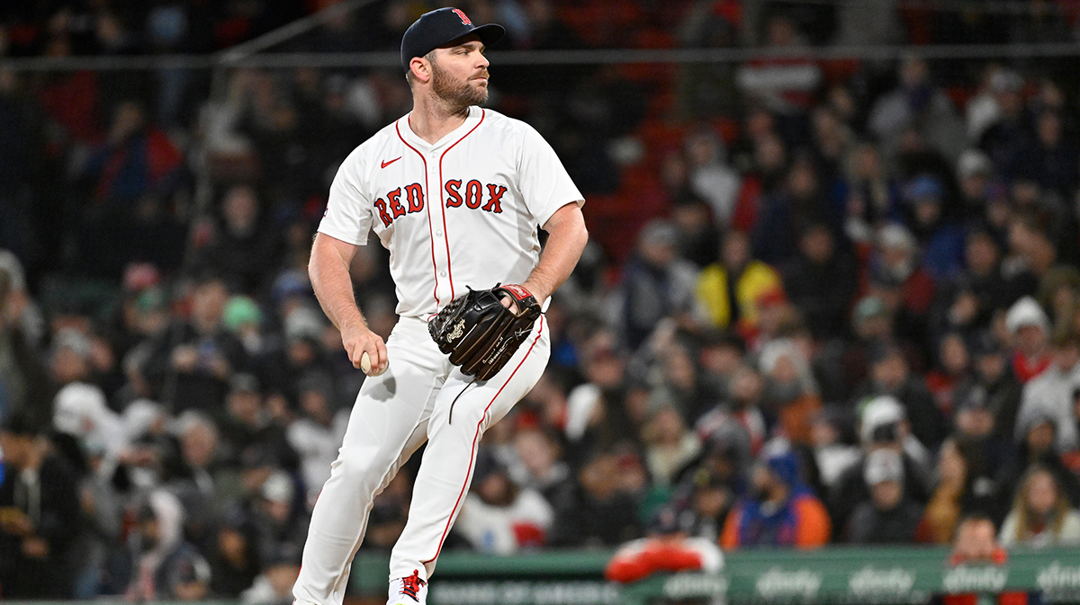 Boston Red Sox relief pitcher Liam Hendriks (31) pitches against the New York Mets during the sixth inning at Fenway Park.