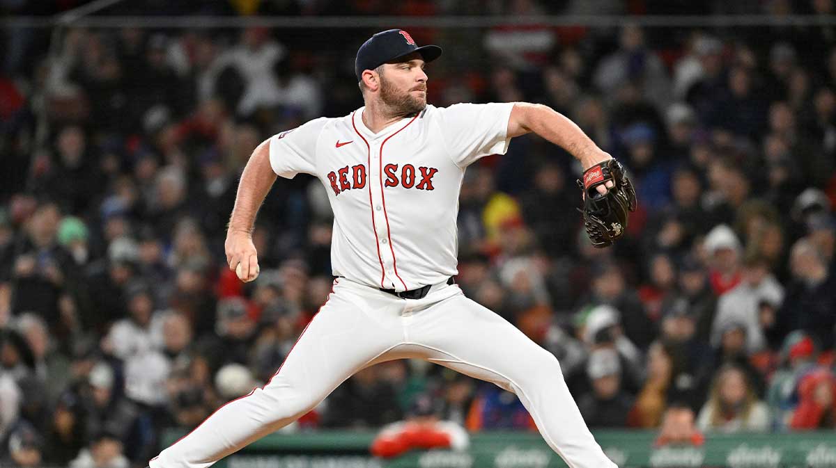 Boston Red Sox relief pitcher Liam Hendriks (31) pitches against the New York Mets during the sixth inning at Fenway Park.