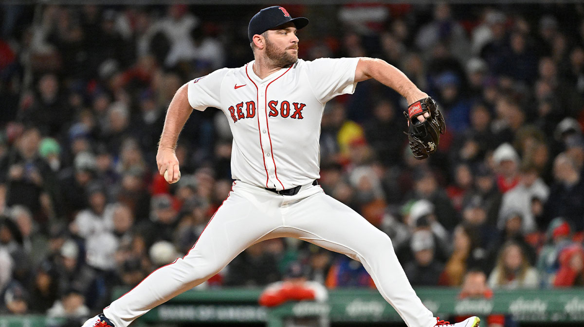 Boston Red Sox relief pitcher Liam Hendriks (31) pitches against the New York Mets during the sixth inning at Fenway Park.