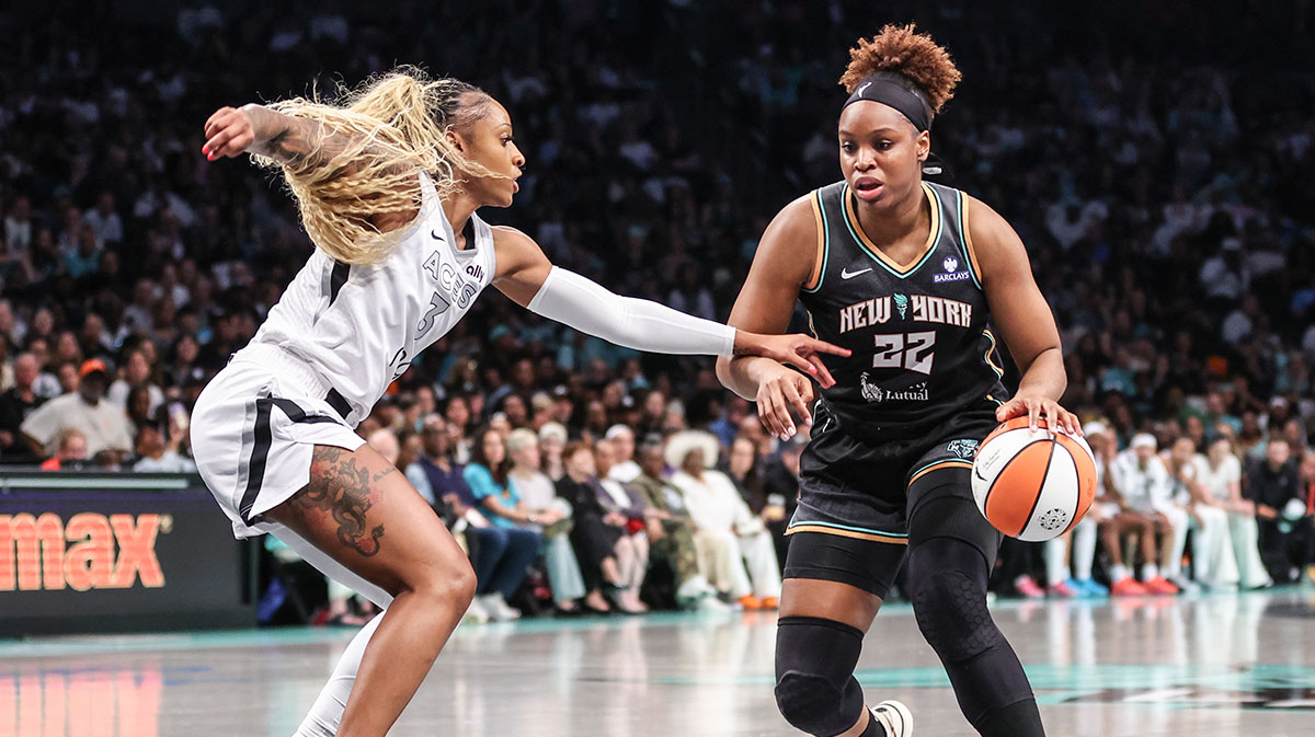 New York Liberty forward Kennedy Burke (22) looks to drive past Las Vegas Aces guard Tiffany Mitchell (3) in the fourth quarter at Barclays Center.