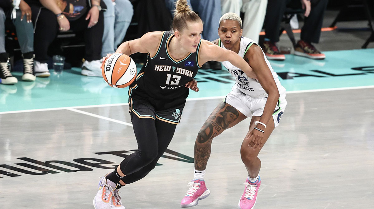 New York Liberty forward Leonie Fiebich (13) controls the ball as Minnesota Lynx guard Courtney Williams (10) defends in the fourth quarter at Barclays Center.