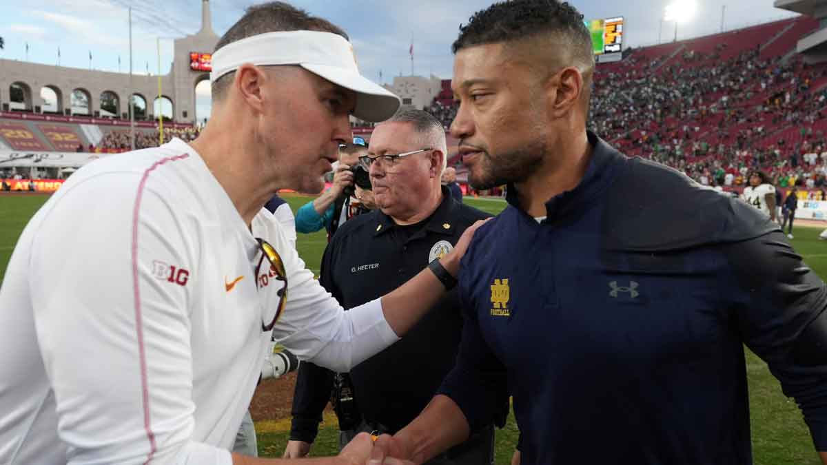 Southern California Trojans head coach Lincoln Riley and Notre Dame Fighting Irish head coach Marcus Freeman shake hands after the game at United Airlines Field at Los Angeles Memorial Coliseum.