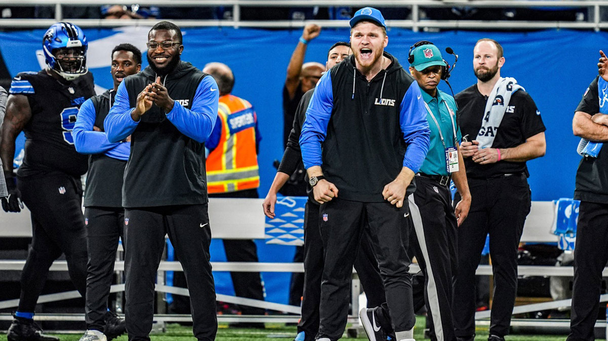 Detroit Lions Aidan Hutchinson watches play from the sidelines, during the second half at Ford Field in Detroit on Sunday, Jan. 5, 2025.