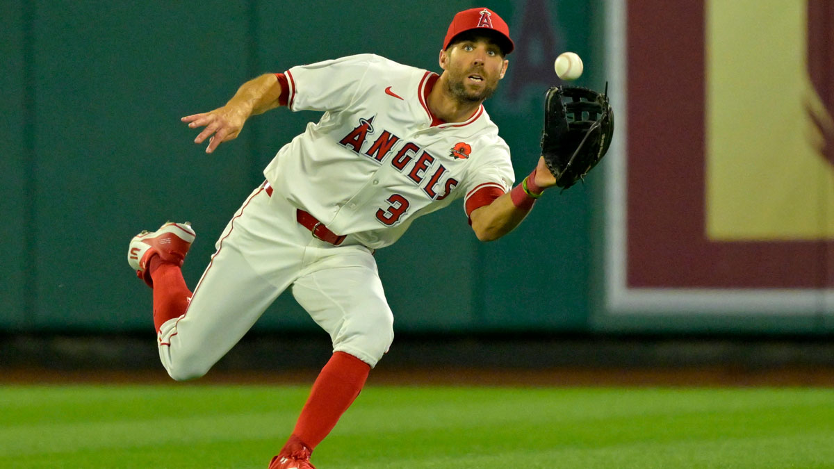 May 26, 2025; Anaheim, California, USA; Los Angeles Angels center fielder Chris Taylor (33) makes a running catch off a ball hit by New York Yankees third baseman Oswald Peraza (18) in the eighth inning at Angel Stadium. Mandatory Credit: Jayne Kamin-Oncea-Imagn Images