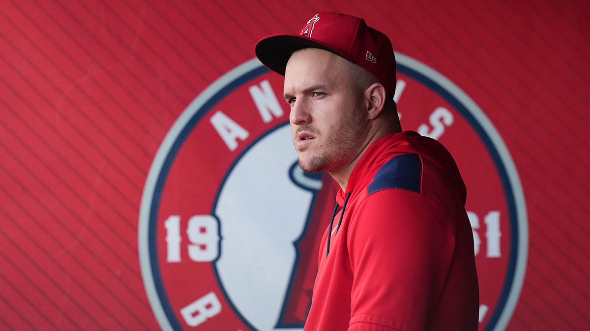 Los Angeles Angels right fielder Mike Trout watches in the dugout during the game at bat at Angel Stadium.