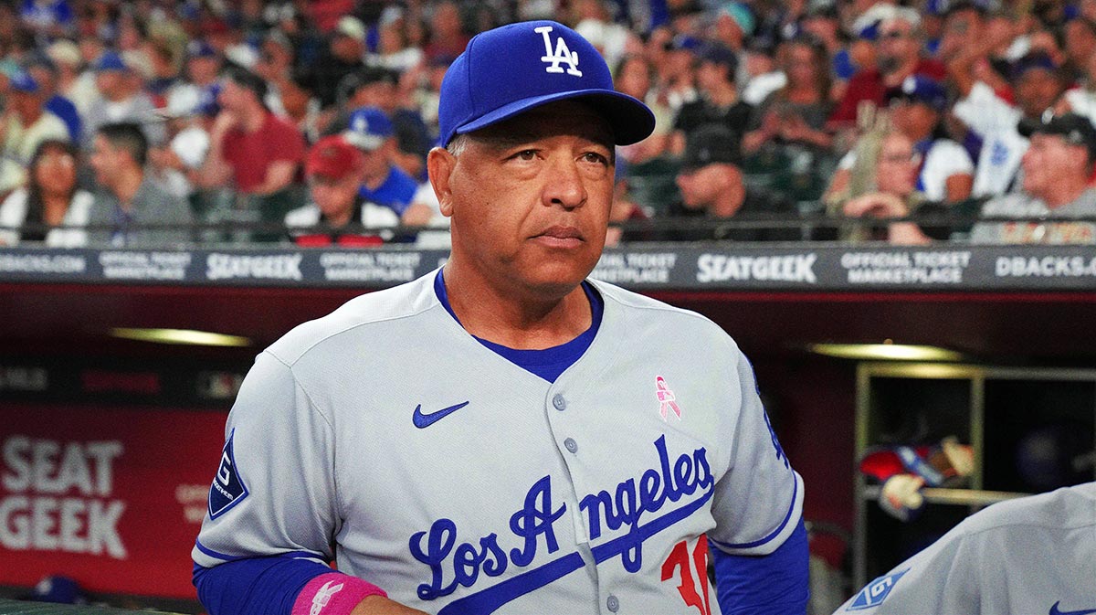 Los Angeles Dodgers manager Dave Roberts (30) gets ready for a game against the Arizona Diamondbacks at Chase Field.