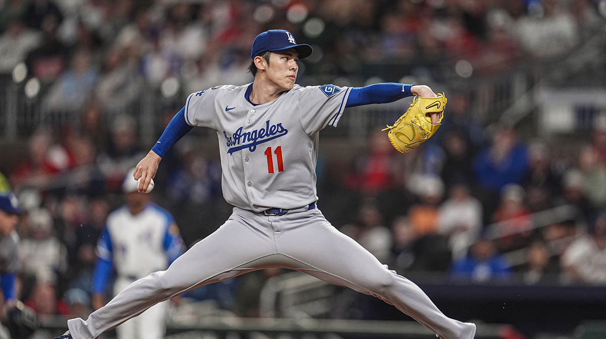 Los Angeles Dodgers starting pitcher Roki Sasaki (11) pitches against the Atlanta Braves during the first inning at Truist Park.