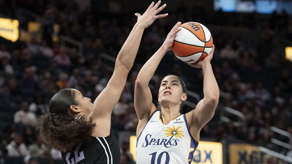 Los Angeles Sparks guard Kelsey Plum shoots the basketball against Golden State Valkyries guard Veronica Burton during the third quarter at Chase Center.