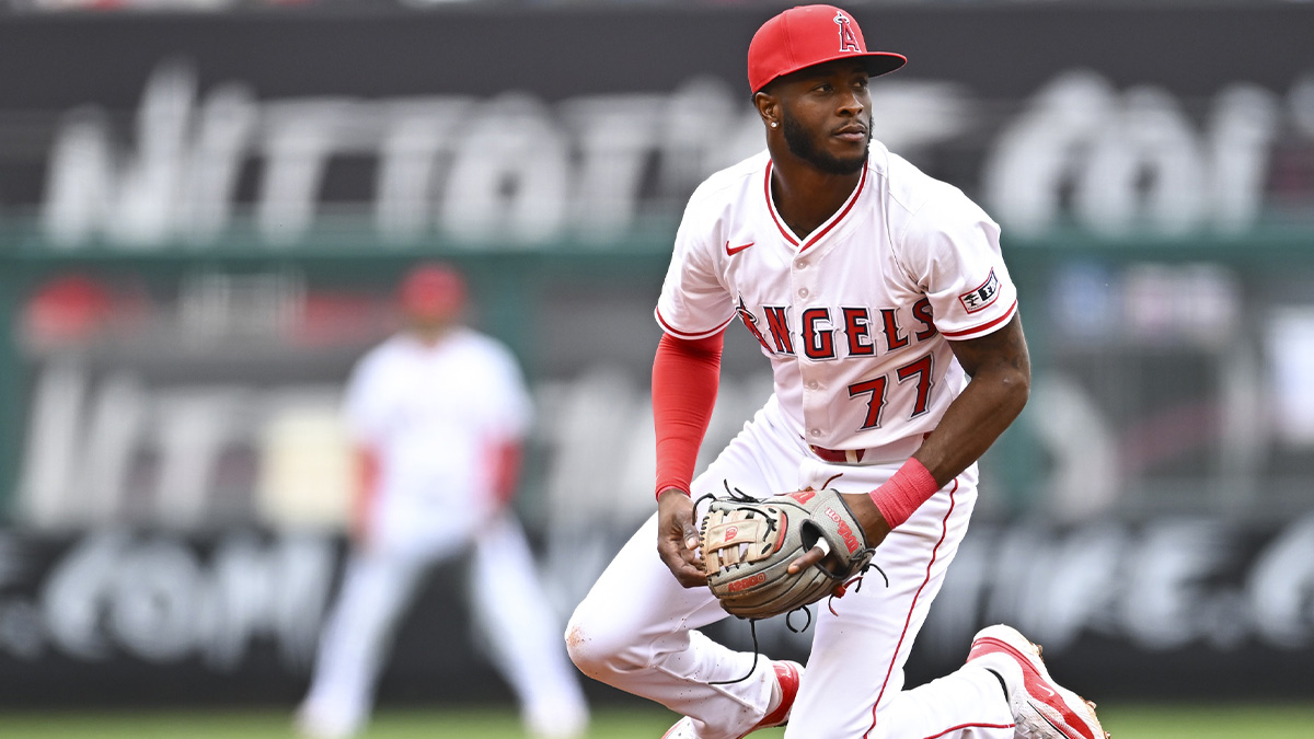 Los Angeles Angels second baseman Tim Anderson (77) looks to throw the ball against the Detroit Tigers during the fourth inning at Angel Stadium.
