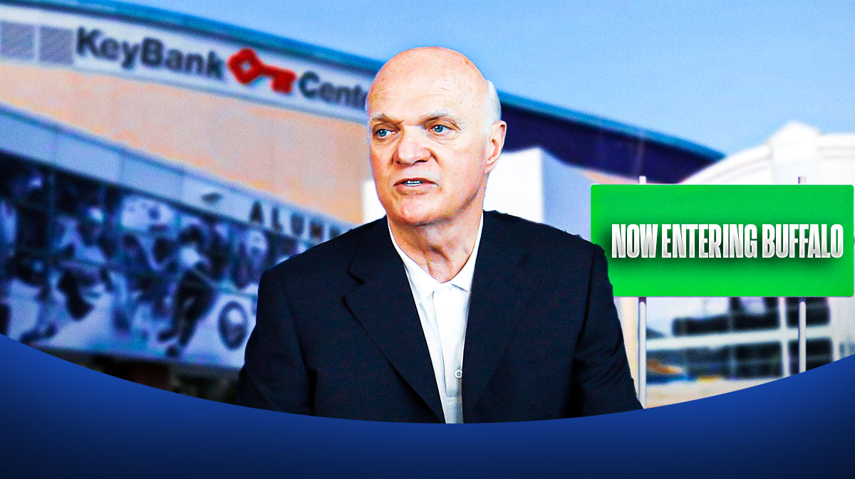 Lou Lamoreillo in front of KeyBank Center in Buffalo, with a road sign that says "Now Entering Buffalo"