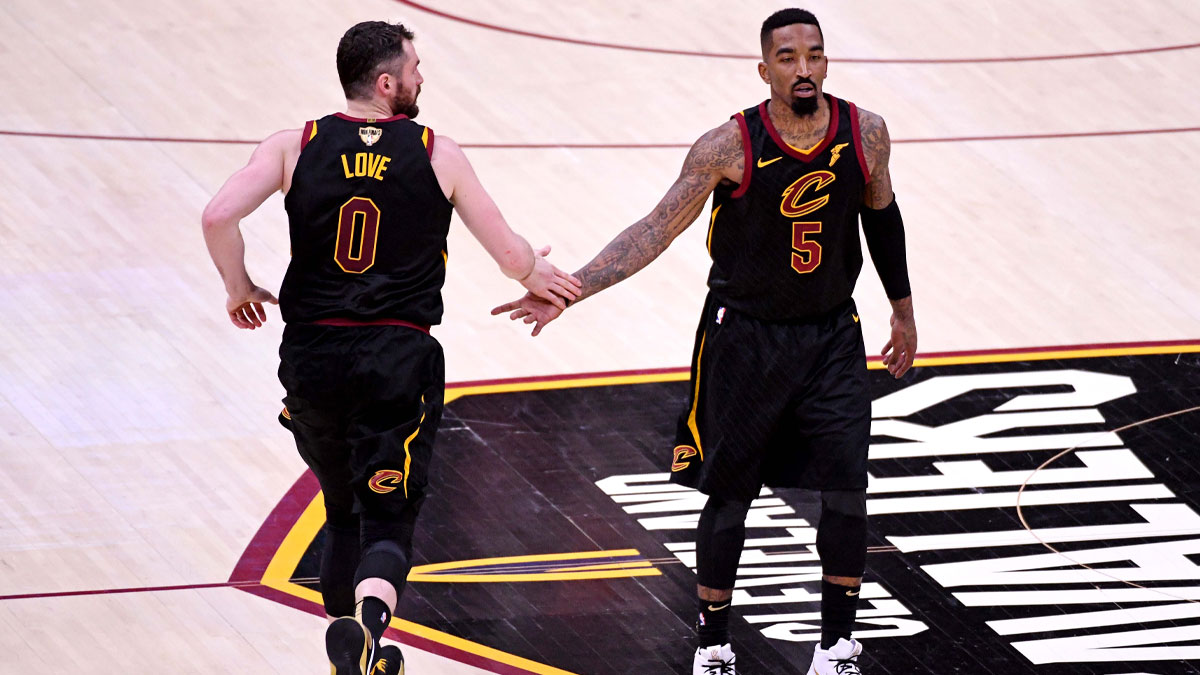Cleveland Cavaliers guard JR Smith (5) and center Kevin Love (0) celebrate during the second quarter against the Golden State Warriors in game three of the 2018 NBA Finals at Quicken Loans Arena.