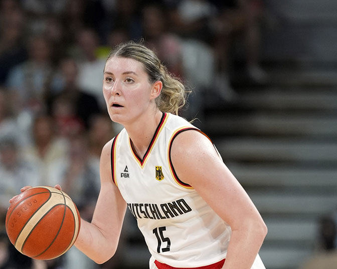 Germany centre Luisa Geiselsoder (15) controls the ball against the United States in the second half in a women’s group C game during the Paris 2024 Olympic Summer Games at Stade Pierre-Mauroy.