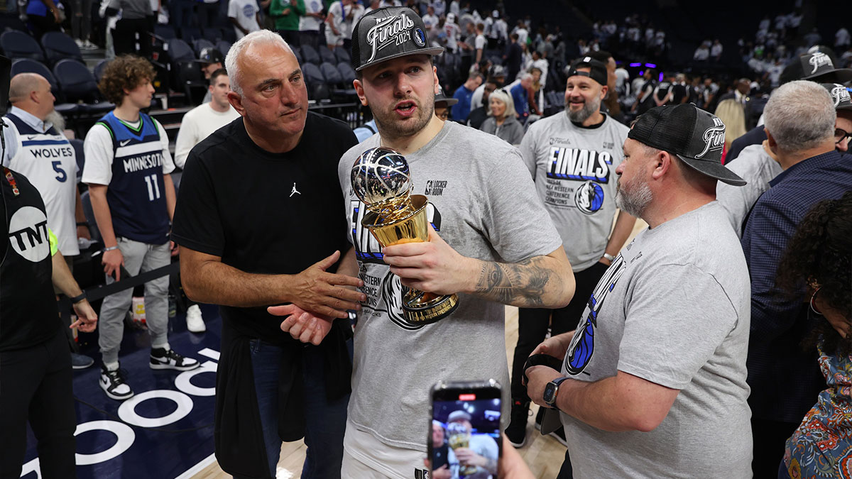 Dallas Mavericks guard Luka Doncic (77) celebrates after winning the Western Confrerence Championship against the Minnesota Timberwolves in game five of the western conference finals for the 2024 NBA playoffs at Target Center.