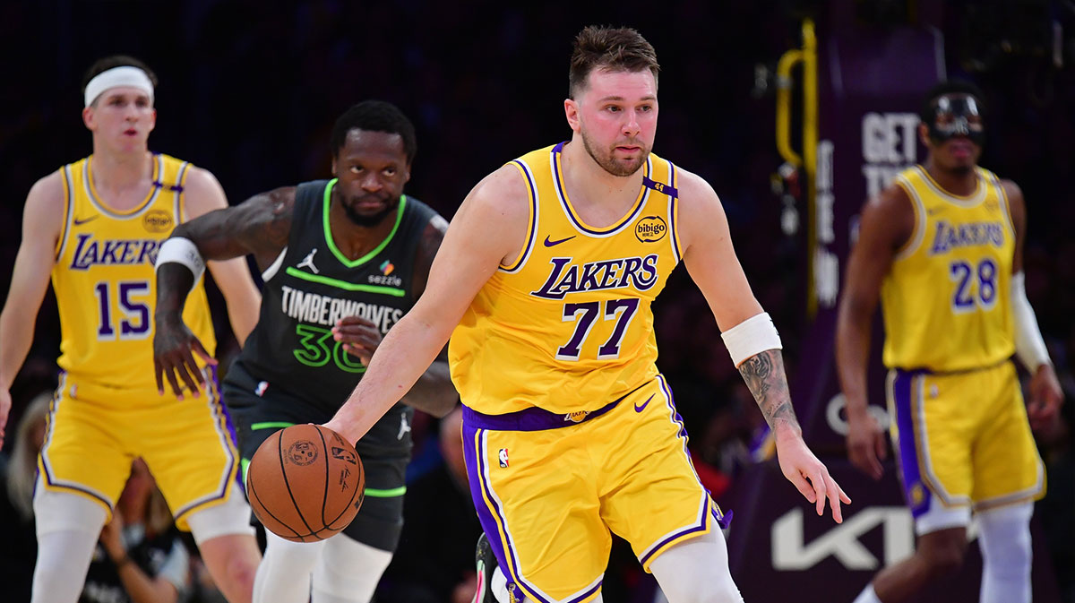 Los Angeles Lakers guard Luka Doncic (77) moves the ball up court against the Minnesota Timberwolves during the first half in game five of first round for the 2025 NBA Playoffs at Crypto.com Arena.