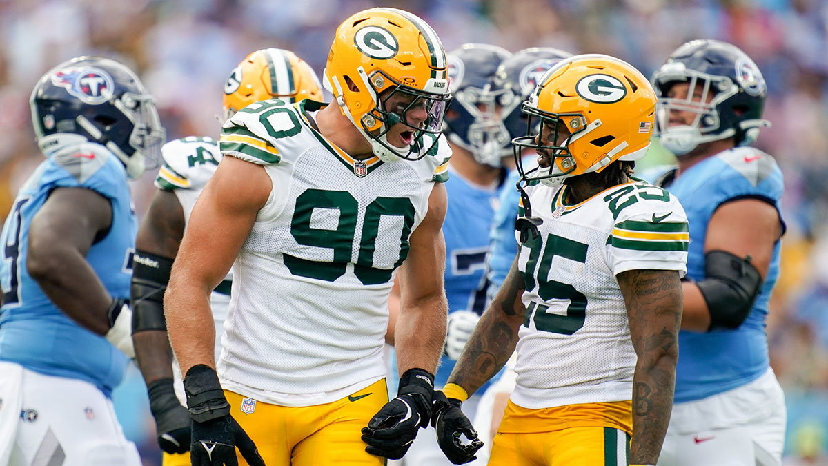 Green Bay Packers defensive end Lukas Van Ness (90) celebrates sacking Tennessee Titans quarterback Will Levis with cornerback Keisean Nixon (25) during the second quarter at Nissan Stadium in Nashville, Tenn., Sunday, Sept. 22, 2024.