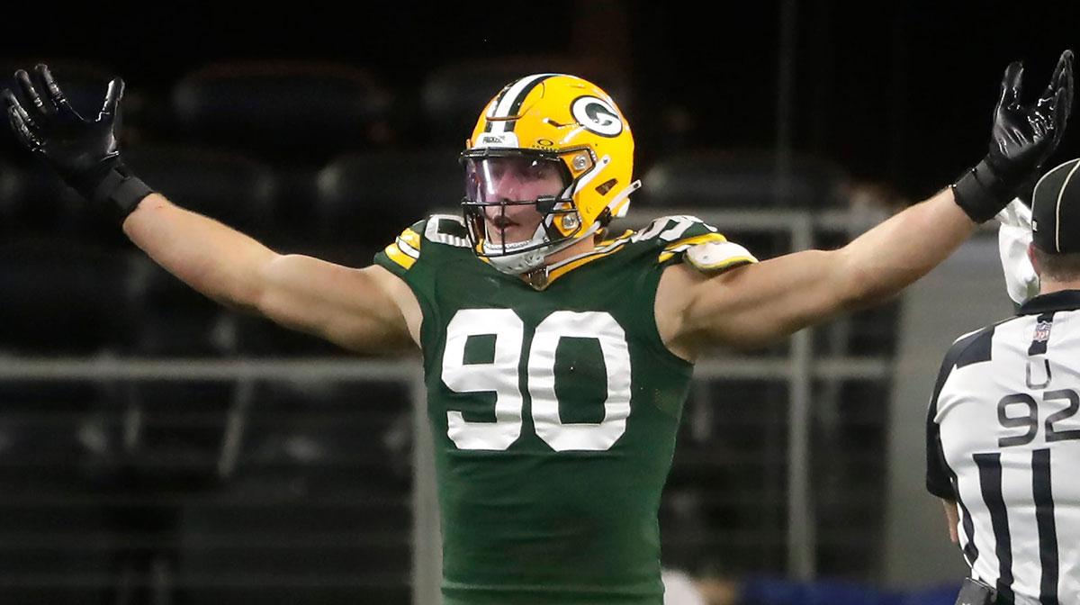 Green Bay Packers linebacker Lukas Van Ness (90) reacts against the Dallas Cowboys during the fourth quarter of their wild card playoff game Sunday, January 14, 2024 at AT&T Stadium in Arlington, Texas. Green Bay defeated Dallas 48-32.