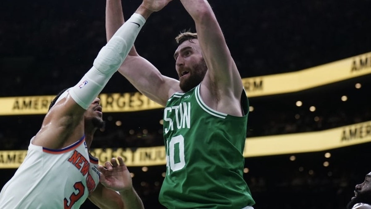 Boston Celtics center Luke Kornet (40) grabs the rebound against New York Knicks guard Josh Hart (3) in the second quarter during game two of the second round for the 2025 NBA Playoffs at TD Garden.